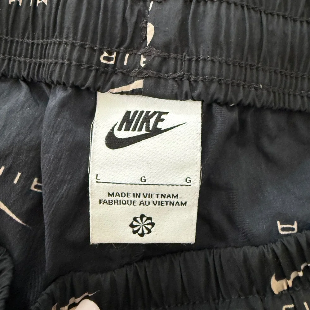 Nike Air Womans Large Woven Jogger Pants Black All Over Swoosh Logo DV8058-010